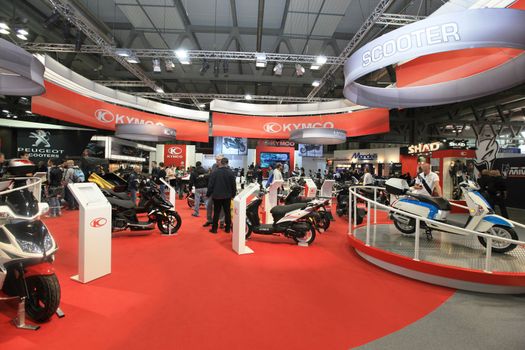 Visiting motorcycels stands during EICMA 2011, International Motorcycle Exhibition in Milan, Italy