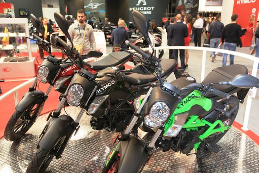 Visiting motorcycels stands during EICMA 2011, International Motorcycle Exhibition in Milan, Italy