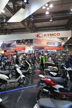 Visiting motorcycels stands during EICMA 2011, International Motorcycle Exhibition in Milan, Italy