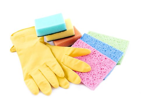 Sponges and gloves for cleaning over white