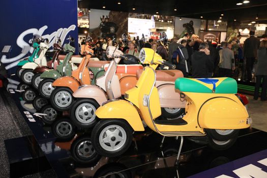 Visiting scooters and motorcycels stands during EICMA 2011, International Motorcycle Exhibition in Milan, Italy