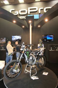 Visiting scooters and motorcycels stands during EICMA 2011, International Motorcycle Exhibition in Milan, Italy