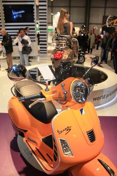 Visiting scooters and motorcycels stands during EICMA 2011, International Motorcycle Exhibition in Milan, Italy