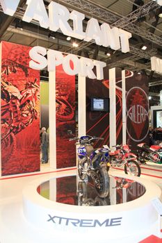 Visiting scooters and motorcycels stands during EICMA 2011, International Motorcycle Exhibition in Milan, Italy