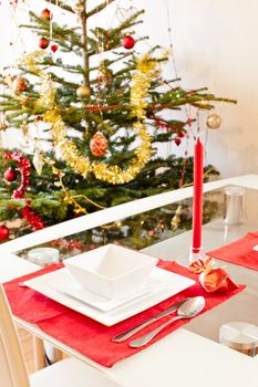 decorated Christmas tree and Christmas table