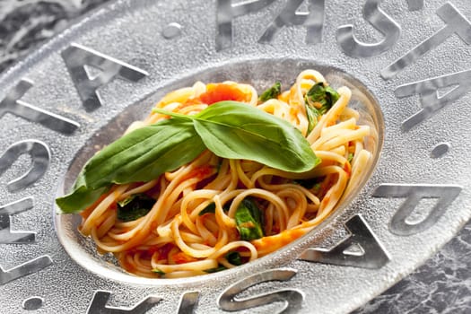 spaghetti with tomatoes and basil
