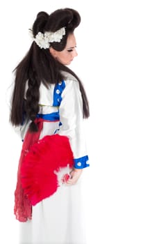 Portrait of the girl of the Asian appearance with a make-up under the geisha on a white background