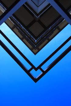 Abstract shot of building against blue sky