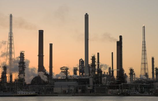 Oil refinery at sunset in Anwerp port