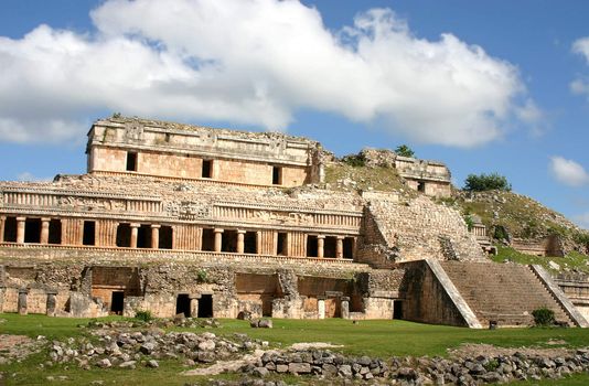 Mexican ruins of maya civilization over blue sky