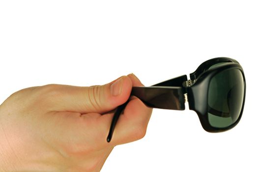 antisun glasses on a womanish hand in form person