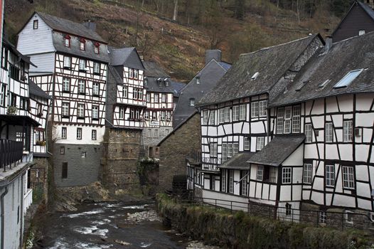Remark for inspector: _Galthaus_ is a generic word in German like _Hotel_ (it is a kind of a hotel), it's not a brand name or a title.

Historic center of Monschau village (Germany) at the Rur river.