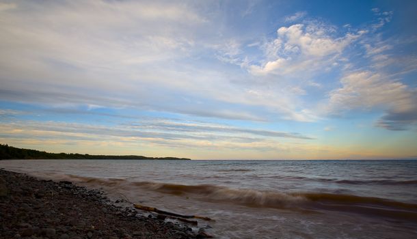 Lake Superior in the evening with a thoughtful sky and surf