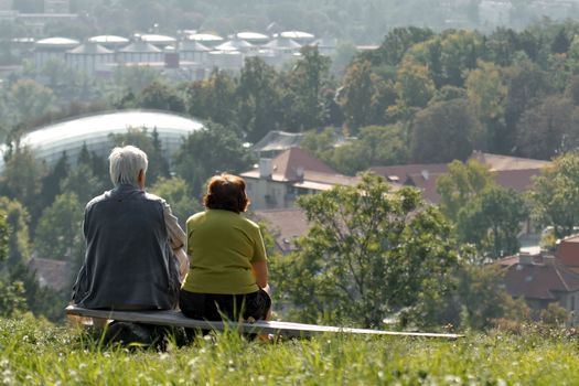 two old people on bench