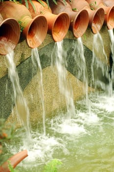 Water pots fountain in garden