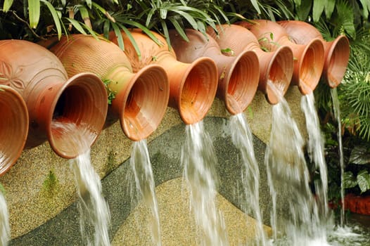 water pots fountain in garden