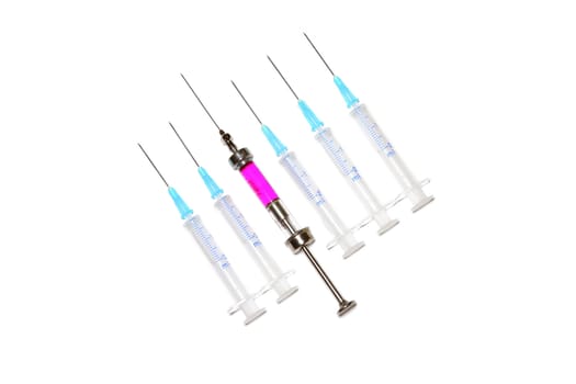 six syringes in row on white background