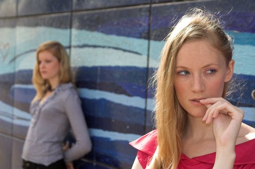 two pretty adult girls have fallen out