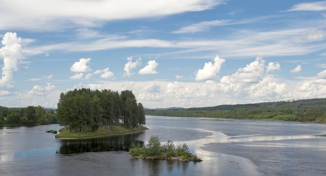 Two small islands on a river - Stoa, Norway