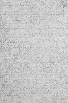 Turksish script engraved in marble on a wall. Great texture.