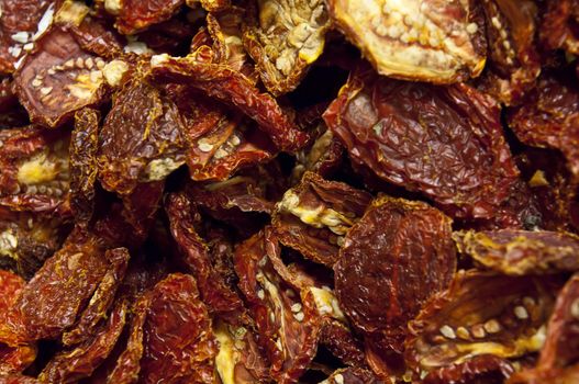 A whole pile of sun dried tomatoes. These are organic, fresh, home made sun dried Tomatoes.