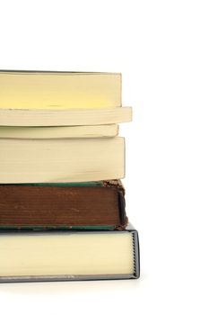 Stack of books on white background