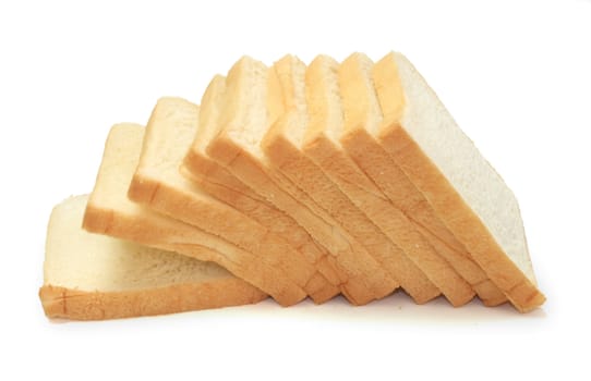 Slices of bread on white background