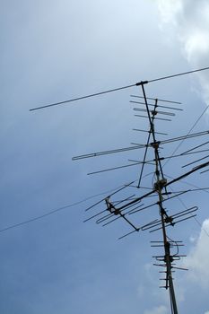 Television antenna blue sky background