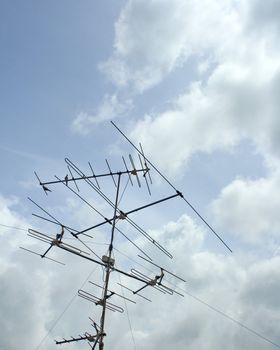 Television antenna blue sky background