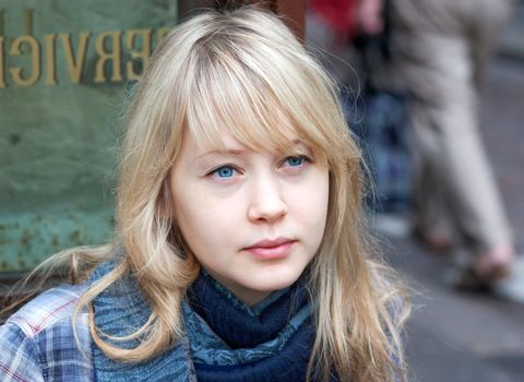 Pretty young woman from Finland with thoughtful expression