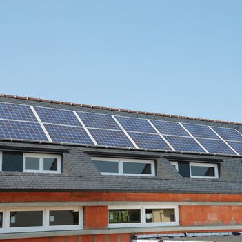 House with solar panels on roof
