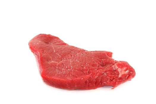 a raw beef rump steaks on a white background

