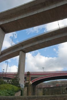 Old victorian bridge overshadowed by flyovers in halifax west yorkshire