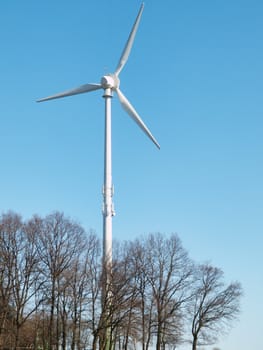 Wind turbine on a clear blue sky