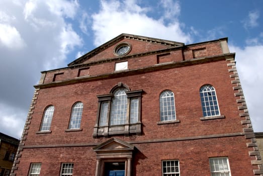 The imposing red brick frontage of a former chapel in Yorkshire