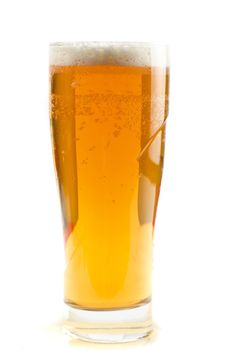 Glass of beer isolated on a white background