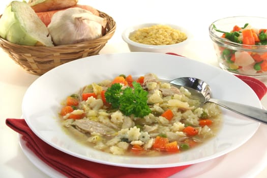 Chicken soup with chicken and fresh vegetables