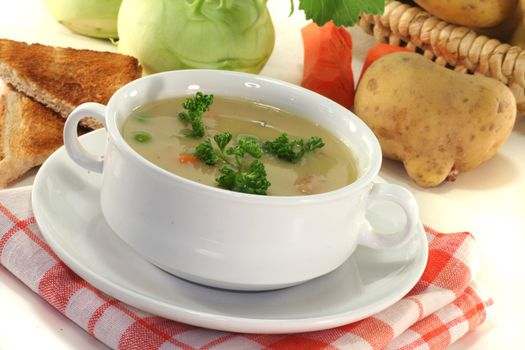 Potato soup with fresh parsley and bacon