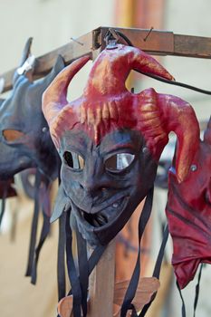 An artisanal demon red and black mask