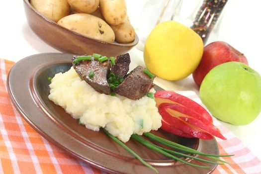 fried liver with mashed potatoes, apple and chives