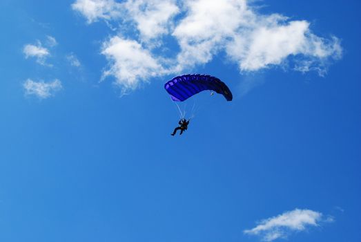 blue hanglider on the sky