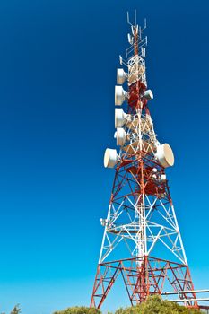 Communications tower with a beautiful blue sky