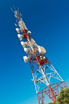 Communications tower with a beautiful blue sky