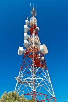 Communications tower with a beautiful blue sky