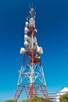 Communications tower with a beautiful blue sky