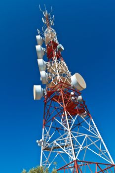 Communications tower with a beautiful blue sky