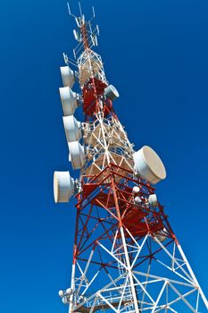 Communications tower with a beautiful blue sky