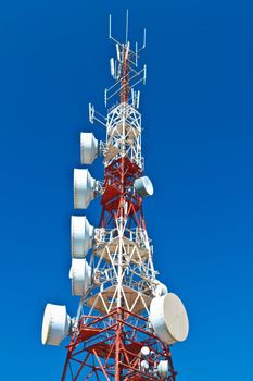 Communications tower with a beautiful blue sky