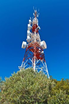 Communications tower with a beautiful blue sky