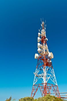 Communications tower with a beautiful blue sky